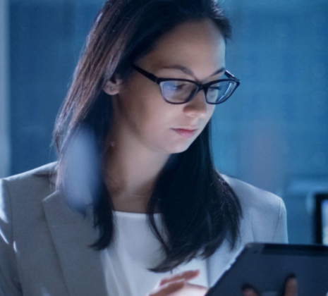 girl checking the data in her tablet